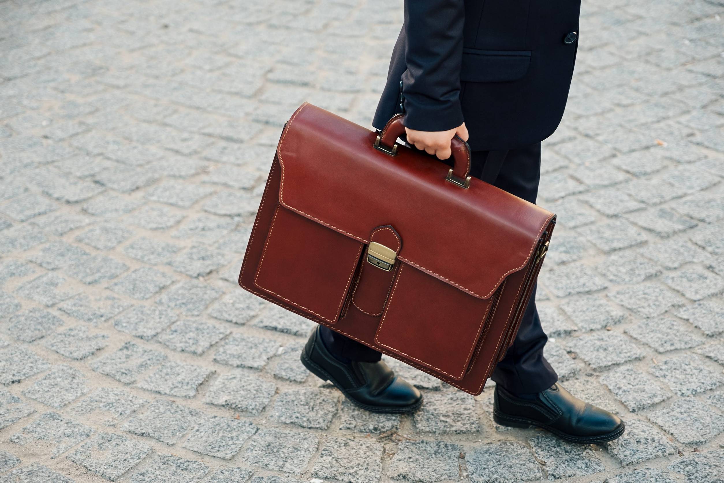 Diplomat Walking With A Briefcase