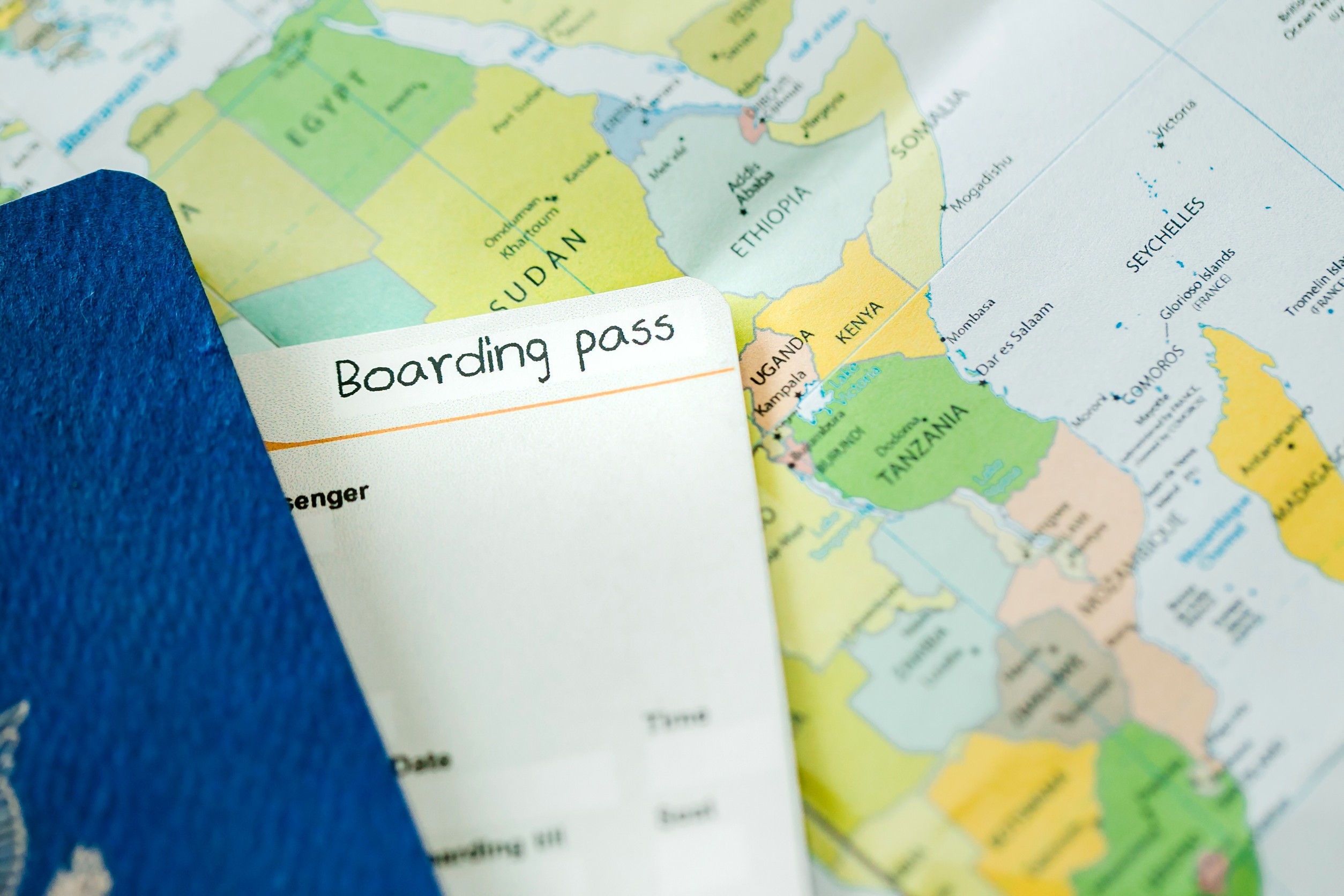 Passport and ticket on a map background