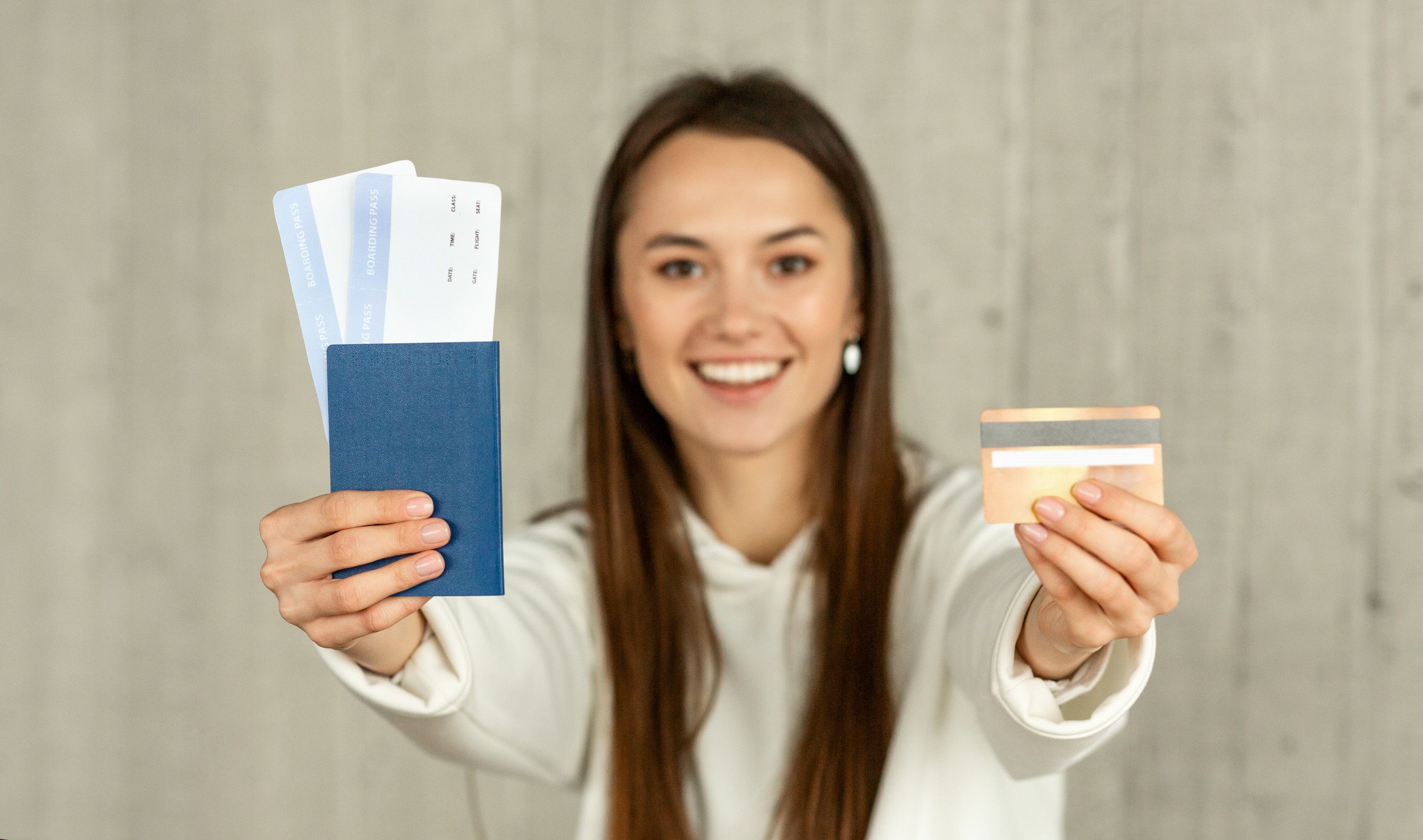 Smiling Girl Holding Passport Tickets And Credit Card Free Space