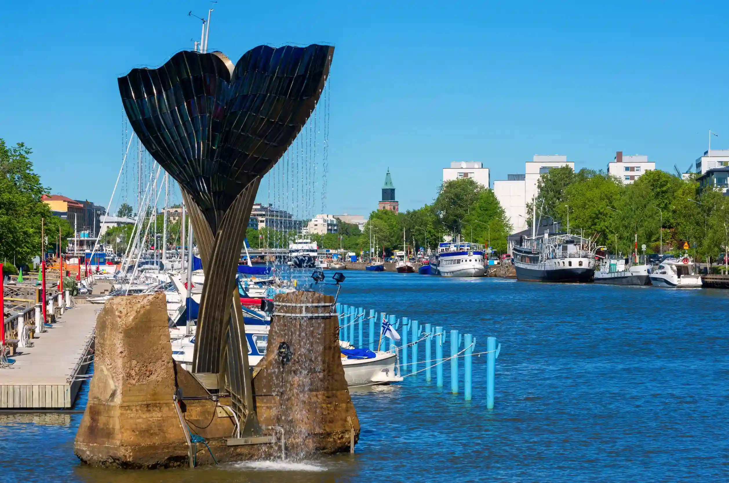 whales tail sculpture harmony by achim kuhn and river aura